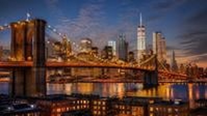 Brooklyn Bridge and skyline at dusk